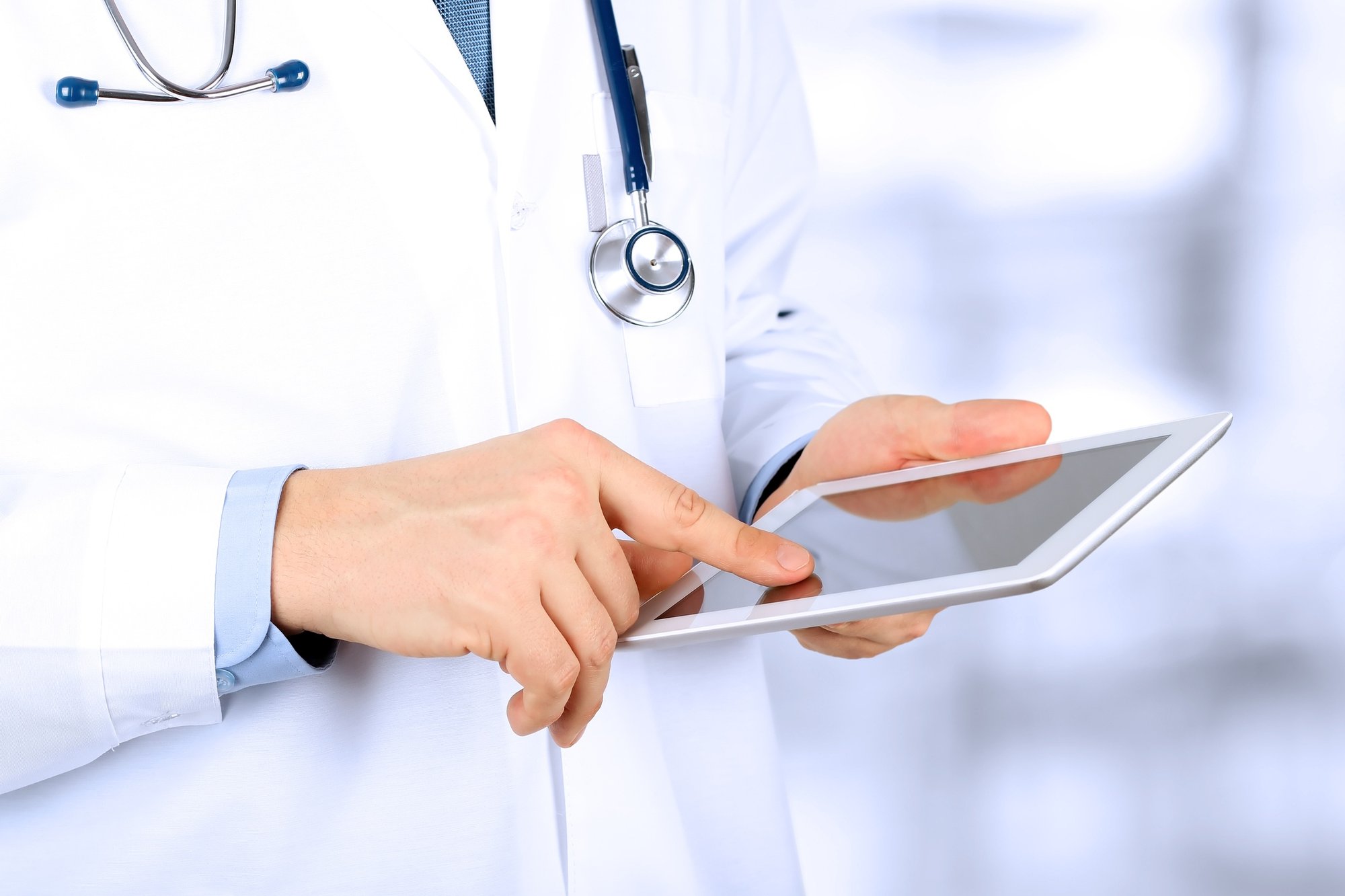 doctor working on a tablet